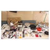 Large Kitchenware Collection Including Utensils, Bakeware, and Small Appliances