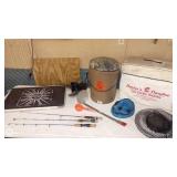 Fishing and Boating Gear Collection with Rods, Nets, Bucket, and Cooler