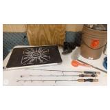 Fishing and Boating Gear Collection with Rods, Nets, Bucket, and Cooler