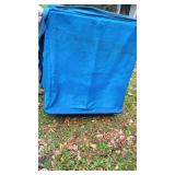 Portable ice house with Blue Canopy and variety of finshing tools