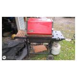 Weber 3-Burner Propane Gas Grill with Red Hood and Side Shelves