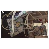 Patio Set with 2 Floral Cushioned Chairs, Glass-Top Table, and Scarecrow Decor