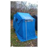 Portable ice house with Blue Canopy and variety of finshing tools
