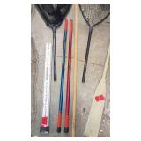 Fishing and Boating Accessory Lot with Nets, Poles, and Oar