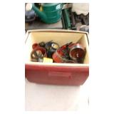 Collection of Assorted Hole Saws and Arbors in Cooler