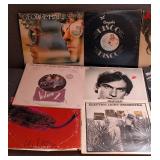 UL - Collection of 14 Classic Rock Vinyl Records Featuring George Harrison, ELO, John Cougar, and More