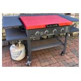 Blackstone 4-Burner Outdoor Gas Griddle with Red Steel Cover and Side Shelves