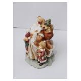 Santa Claus Figurine with Children and Toys