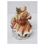 Santa Claus Figurine with Children and Toys