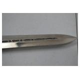 Decorative Dagger With Ornate Sheath and Lion Head Pommel