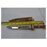 Decorative Dagger With Ornate Sheath and Lion Head Pommel