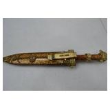 Decorative Dagger With Ornate Sheath and Lion Head Pommel