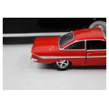 Jada 1:32 Red Diecast Car and Black Chevy Bel Air Convertible Model Lot