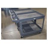 Heavy-duty plastic utility cart with two shelves and compartments