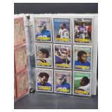 Binder with Assorted Vintage Minnesota Vikings Football Cards and Minnesota North Star Hockey Cards