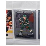 Binder with Assorted Vintage Minnesota Vikings Football Cards and Minnesota North Star Hockey Cards