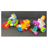 Collection of Assorted Toy Figurines and Vehicles