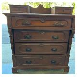 Antique Victorian Walnut Step Back Dresser with Ornate Carvings