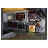 Cabinet of Drawers with Contents - Light Bulbs, MREs, Antique Cameras and Lenses
