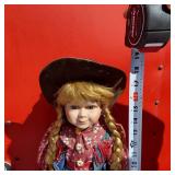 Western Cowboy and Cowgirl Porcelain Dolls, Each approximately 16 inches tall