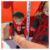 Lot of 3 Porcelain Dolls Including One with Curly Hair and One with Holiday Attire