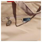 Vareity of Tote Bags Including Floral Print, Red Tote, and Zebra Pattern Bag