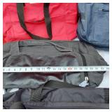 Adidas Black Duffel, Grey Gym Bag, Blue Carry-On, and Red Tote Bag.