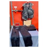 Leather Motorcycle Apparel including Interstate Leather Vest Size L and Interstate Leather Chaps Size Small. And Milwaukee Vest Liner SizeL
