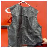 Leather Motorcycle Apparel including Interstate Leather Vest Size L and Interstate Leather Chaps Size Small. And Milwaukee Vest Liner SizeL