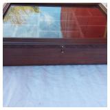 Display Case, May 2004 Framed Calendar