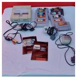 Super Nintendo with Controllers and Games Including Donkey Kong Country, Super Mario World and More