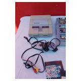 Super Nintendo with Controllers and Games Including Donkey Kong Country, Super Mario World and More
