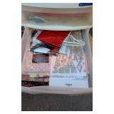 Craft Supplies In Plastic Cabinet, Wrapping Paper