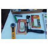 Assorted Household Supplies including Multi-Purpose Cement, Command Hooks, Tape Dispenser, Candles and Light Bulbs