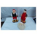 Animated Santa and Mrs. Claus Figures with Santa Face Decoration