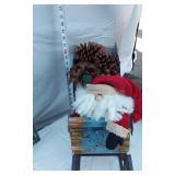 Holiday Decor including Santa Wall Hanging Sled and Sleigh with Pinecones