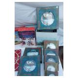 Christmas Decorative Items including Nesting Boxes, Angel Tree Top and Small Lighted Country Village