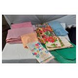 Lot of Tablecloths and Linens including DesignWare Plastic Tablecover, Various Patterns, and Colors