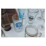 Lot of Assorted Glassware Including Budweiser, Lake Lillian Centennial, Little Crow Archers Mug