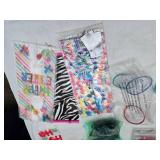 Holiday and Party Supplies including Gift Bags, Hangers, and Decorations