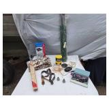 Assorted Household and Craft Items including Reading Glasses, Fabric Roll, Coffee Can, Storage Bags, and More