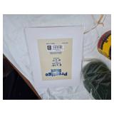 Assorted Household and Craft Items including Reading Glasses, Fabric Roll, Coffee Can, Storage Bags, and More