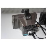 Vintage Polaroid Cameras and Tripods