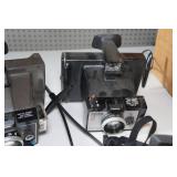 Vintage Polaroid Cameras and Tripods