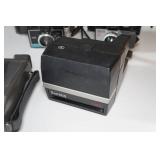 Vintage Polaroid Cameras and Tripods
