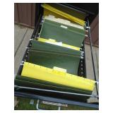 4 drawer filing cabinet. With hanging files. Used condition. As shown.