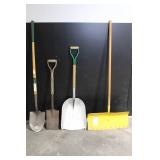Large Assortment of Lawn and Garden Tools Including Rakes, Shovels, Hoes, and Brooms