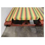 Rectangular Wooden Picnic Table with Benches and Striped Cushions