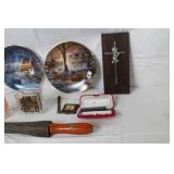 Assorted Collectibles and Decor Lot Including Bradford Exchange Plates, Coin Banks, and Cross Plaque