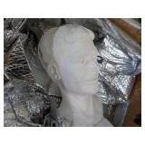 1 Plaster Décor Head in a storage ...